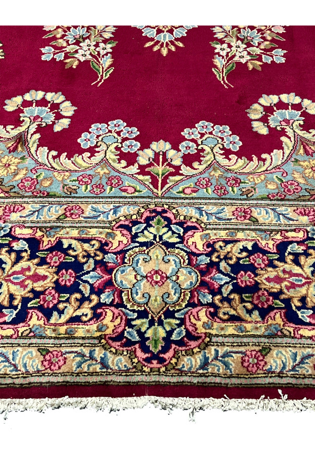 10x14 Persian Kerman rug lower border navy floral vine ivory fringe detail