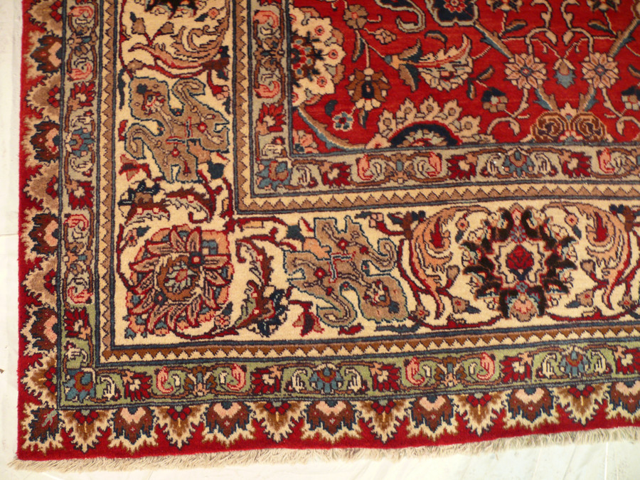 Detailed border closeup showing palmettes rosettes and vines on the midnight navy band
