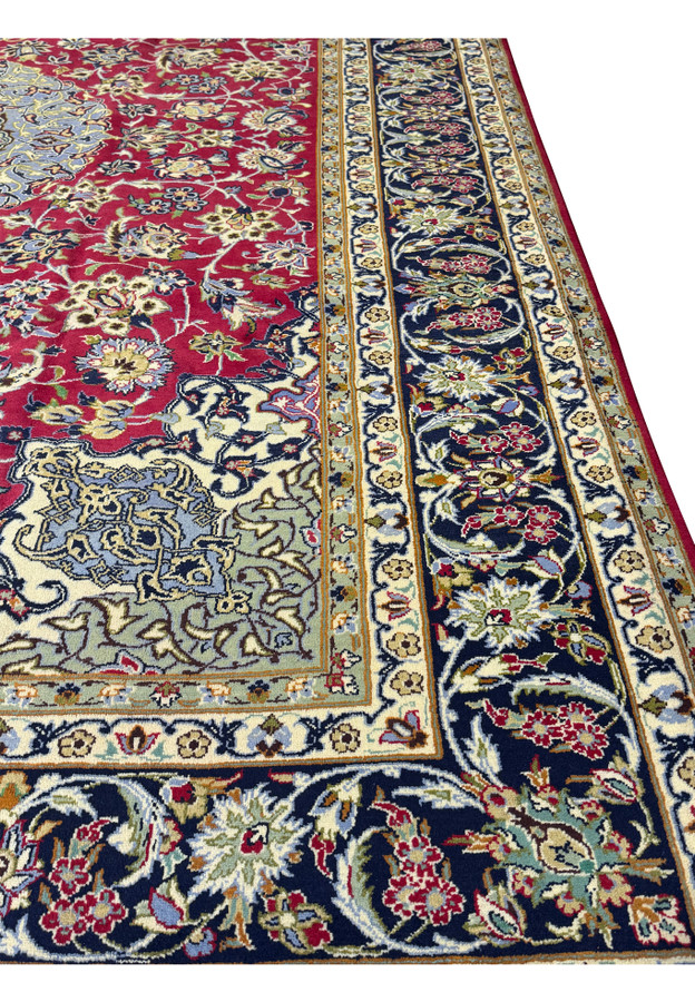 Side view of Persian Isfahan Rug emphasizing the fine craftsmanship and color harmony.