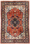 Full view of a 6'7 x 9'7 Geometric Persian Heriz rug with central navy medallion, red field, and detailed floral borders