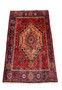Close-up of 4x6 Persian Gholtogh rug displaying intricate red and blue patterns
