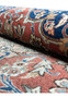 Rolled 3x5 Antique Mashad Rug, illustrating the plush pile and texture of the high-quality wool