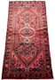 Overhead view of a 3'5 x 6'5 Persian Baluch rug with rust red field and traditional diamond medallionOverhead view of a 3'5 x 6'5 Persian Baluch rug with rust red field and traditional diamond medallion