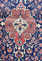 Detailed view of the floral motifs and patterns of a Vintage Persian Sarough Rug, highlighting the fine craftsmanship