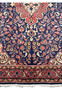 Zoomed-in detail of the 3x5 Vintage Persian Sarough Rug's border patterns and rich color palette.