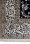A close-up of the Persian Nain Rug border, illustrating the fine details and silk highlights.