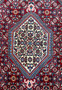 Angle view of the Persian Bijar Rug, emphasizing the tight weave and robust borders
