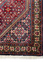 Close-up view of the Persian Bijar Rug's edge, displaying the fine craftsmanship and fringe details