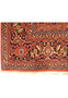 A section of the Persian Bijar Rug, focusing on the detailed pattern and vibrant color palette