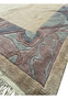 Close-up of the Modern Royal Tibetan rug's fringe and border pattern.