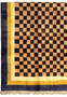 Detailed view of the Nepal rug's texture and weave, highlighting the deep brown and beige checkerboard pattern and the rug's fringe.