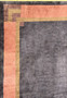 Detailed view of the rug's edge, highlighting the precise pattern and color transitions