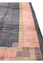 Partial view of the Modern Tibet Rug, focusing on the geometric pattern and fringe detail