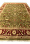 Antique-style 10x15 Chobi Peshawar rug with intricate botanical motifs