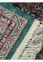 Fringed edge of a Persian Tabriz rug revealing the quality of hand-knotted construction
