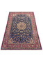 Wide view of the Persian Isfahan rug laid out to display the full pattern symmetry and color harmony."