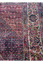 Partial view of the Persian Bijar Rug, illustrating the rich texture and color variation across its surface