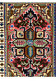A close-up of the lower half of the Persian Tabriz rug, showing the detailed weaving and the rich, warm colors of the floral designs against the background