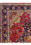 Corner section of the Persian Geometric Tabriz Rug displaying the intersection of the main field's floral design with the ornate border patterns