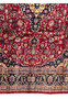 Lower half of the Persian Mashad Rug focusing on the dense floral patterns and medallion design.