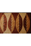 Close-up of leaf motif in beige and burnt orange tones