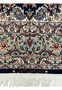 Signed Persian Isfahan rug with Heydari weaver name and Iran Esfahan inscription on silk end panel