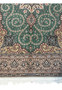 Lower border detail of Isfahan wool and silk rug with floral motifs