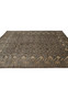 Zigler Transitional Rug showing transition between field and border with geometric motifs in muted earth tones.