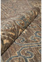 Zigler Transitional Rug rolled corner highlighting wool pile, earthy brown and grey tones with beige accents.