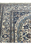 Upper edge view of Square Persian Nain Rug with ivory and navy border pattern