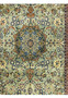 Close-up of the central floral field and medallion pattern of the Tabriz rug