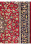 Navy border with ivory floral scrolls on Persian Isfahan rug
