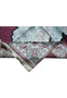 Corner and fringe of 6x9’5 Chinese silk oriental rug showing fine knots and floral border pattern