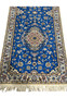 “Ivory border and off-white silk highlights on the Blue Persian Nain 6LA Runner, hand-knotted in Iran.