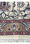Backside of Persian Nain 4 LA Habibian rug showing dense approx 800 KPSI weave, crisp floral outlines, beige foundation, and tight knot craftsmanship.