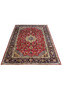 Top view of 8'5 x 11'8 Persian Isfahan rug with navy border, red field, and detailed floral designs.