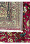 Backside view of the 9'9 x 12'4 Persian Tabriz rug showing tight handwoven knots, cotton foundation, and original fringe with intricate border design.