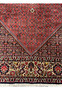 Lower floral border of Persian Bijar rug with vine and palmette motifs