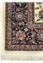 Dark navy floral border detail of signed Persian Mashad Saber Persian rug