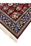 Edge and fringe detail of Persian Isfahan wool and silk rug showing clean finishing