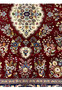 Detailed pattern close-up of Persian Isfahan rug with silk highlights and fine knot structure
