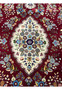 Central ivory medallion of Persian Isfahan rug with silk floral detailing