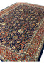 Angled view of Persian Sarough rug showing pile texture and wool quality