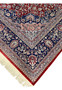Edge and fringe detail of antique Persian Kashan rug in excellent condition