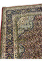 Side view of Persian Bijar iron rug highlighting border structure and heavy construction