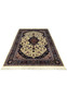 Persian 5x8 Tabriz rug laid flat showing full medallion layout and balanced floral composition