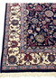 Side border close up of Persian Sarough rug with crisp pattern edges and balanced color contrast