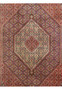 Geometric medallion detail of Persian Bijar rug with deep red and ivory color contrast