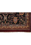 Dark floral border detail of traditional Sarough rug