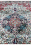 Midfield floral detailing on finely woven silk oriental rug